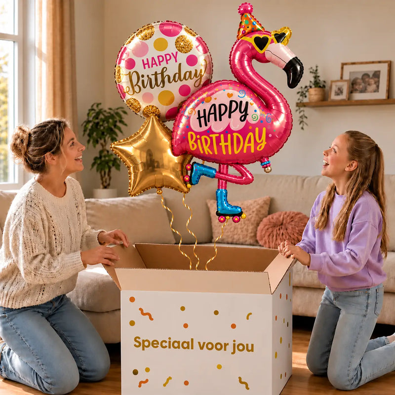 Happy Birthday Flamingo XL Trosje zweeft uit de Speciaal voor jou doos in een warme woonkamer