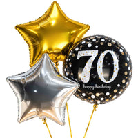 70 Jaar Trosje Zilver/Zwart/Goud – heliumgevulde ballonnen met dunne gouden lintjes op een witte achtergrond