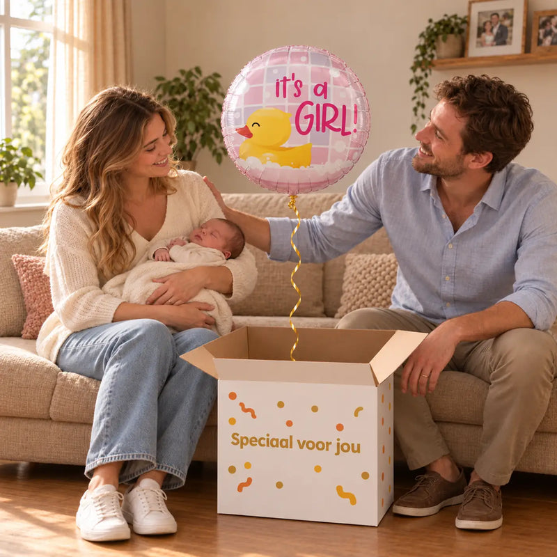Uitpakmoment met It's A Girl Badeend Helium Ballon uit een cadeaudoos van Ballonnenshop.nl