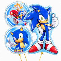 Sonic Trosje – 84 cm – heliumgevulde ballonnen met dunne gouden lintjes op een witte achtergrond