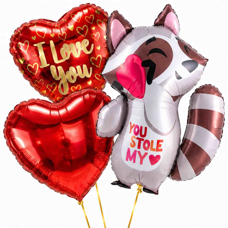 You Stole My Heart Ballonnentros – heliumgevulde ballonnen met dunne gouden lintjes op een witte achtergrond